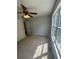 Bedroom with a ceiling fan and a view of the landscape at 955 Tributary Way, Dacula, GA 30019