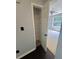 Walk-in closet with shelving leading into a bedroom at 955 Tributary Way, Dacula, GA 30019