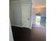 Front entry features hardwood floors and a chandelier at 955 Tributary Way, Dacula, GA 30019