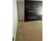 Close up view of the electric fireplace and stained wood accent wall at 955 Tributary Way, Dacula, GA 30019