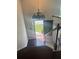 Foyer with staircase leading to front door with sidelight window at 955 Tributary Way, Dacula, GA 30019