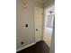 Hallway with hardwood floors leading to bedroom at 955 Tributary Way, Dacula, GA 30019