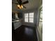 Sunlit kitchen nook features hardwood floors and multiple windows at 955 Tributary Way, Dacula, GA 30019