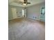 Bright main bedroom with tray ceilings and ample closet space at 955 Tributary Way, Dacula, GA 30019