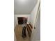 Storage area with a vacuum and assorted building materials for DIY projects and home repairs at 955 Tributary Way, Dacula, GA 30019