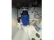 Garbage disposal and under-sink plumbing featuring soap bottle at 955 Tributary Way, Dacula, GA 30019