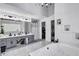Luxurious bathroom with tub, large double vanity, and spacious layout at 4220 Chapel Hill Farms Dr, Douglasville, GA 30135