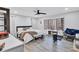 Inviting bedroom with a bay window, ceiling fan, and hardwood floors at 4220 Chapel Hill Farms Dr, Douglasville, GA 30135