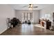 Spacious room features a ceiling fan, wood floors, and a large window at 4220 Chapel Hill Farms Dr, Douglasville, GA 30135
