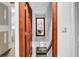 Upstairs hallway with new laminate floors and freshly painted interior at 4220 Chapel Hill Farms Dr, Douglasville, GA 30135