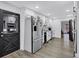 Bright kitchen featuring stainless steel appliances, white cabinets, and updated countertops at 4220 Chapel Hill Farms Dr, Douglasville, GA 30135