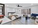 Main bedroom features a large window, ceiling fan, and wood floors at 4220 Chapel Hill Farms Dr, Douglasville, GA 30135