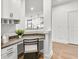 Built-in office nook with granite countertop and white cabinets at 5230 Hyde Rd, Cumming, GA 30040