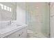 Modern bathroom with a white vanity and sink, a large mirror, and glass enclosed shower at 4356 N Buckhead Ne Dr, Atlanta, GA 30342