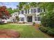 Classic two-story home featuring a well-kept lawn, mature landscaping, and traditional architectural features at 4356 N Buckhead Ne Dr, Atlanta, GA 30342