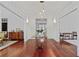 Bright foyer with hardwood floors, elegant lighting, and views into adjacent rooms at 4356 N Buckhead Ne Dr, Atlanta, GA 30342