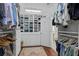 Large walk-in closet with custom shelving and storage for clothing and accessories at 4356 N Buckhead Ne Dr, Atlanta, GA 30342