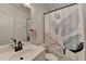 Stylish bathroom featuring modern fixtures, a leaf-patterned shower curtain, and a clean design at 4391 Encore Blvd, Duluth, GA 30097