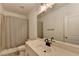 Neutral bathroom featuring a shower-tub combo, toilet, and a vanity with an undermount sink at 4391 Encore Blvd, Duluth, GA 30097