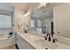 Bright bathroom with double sinks, a glass shower, and a soaking tub at 4391 Encore Blvd, Duluth, GA 30097