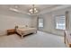 Spacious bedroom with tray ceilings, neutral tones, and lots of natural light at 4391 Encore Blvd, Duluth, GA 30097