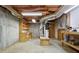 Unfinished basement with mechanicals, storage shelves, concrete walls, and duct work in the ceiling at 1145 Cool Springs Nw Dr, Kennesaw, GA 30144