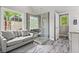 Relaxing bathroom featuring a shower with seat and view of the backyard at 1145 Cool Springs Nw Dr, Kennesaw, GA 30144