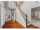 Spacious foyer with hardwood floors and a staircase leading to the second level at 1145 Cool Springs Nw Dr, Kennesaw, GA 30144