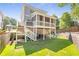 Expansive backyard featuring a spacious screened porch, playground, and lush greenery for outdoor enjoyment at 3042 Jefferson St, Atlanta, GA 30341