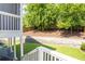View from the back deck showcasing the spacious backyard with mature trees and beautiful landscaping at 3042 Jefferson St, Atlanta, GA 30341
