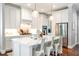Well-appointed kitchen featuring a central island, stainless steel appliances, and pendant lighting at 3042 Jefferson St, Atlanta, GA 30341
