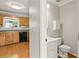 Kitchen and bathroom with tile floors and modern appliances at 406 Mount Vernon Ct, Woodstock, GA 30189