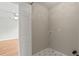 Practical laundry room featuring tiled floors and a laundry hookup, offering functionality with a view to another room at 406 Mount Vernon Ct, Woodstock, GA 30189