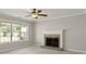 Neutral living room with large window and fireplace at 406 Mount Vernon Ct, Woodstock, GA 30189