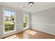 Living room with hardwood floors and natural light at 406 Mount Vernon Ct, Woodstock, GA 30189