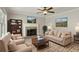 Nicely decorated living room with a fireplace and comfortable seating at 406 Mount Vernon Ct, Woodstock, GA 30189