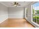 Bright office space with natural light, neutral walls, and stylish wood floors at 406 Mount Vernon Ct, Woodstock, GA 30189