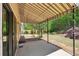 Covered patio and well-maintained backyard, perfect for relaxing and entertaining outdoors at 1745 Fairburn Dr, Cumming, GA 30040