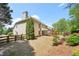 Large, lush backyard with a covered patio, offering ample space for outdoor activities and relaxation at 1745 Fairburn Dr, Cumming, GA 30040