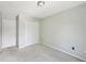 Bedroom with carpet and large double door closet at 1745 Fairburn Dr, Cumming, GA 30040