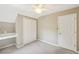 Bedroom with built-in desk and large closet at 1745 Fairburn Dr, Cumming, GA 30040