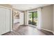 Bedroom with hardwood floors, white trim, large window and natural light at 1745 Fairburn Dr, Cumming, GA 30040