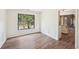 Dining room with picture window, beautiful molding and wood floors at 1745 Fairburn Dr, Cumming, GA 30040