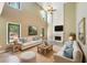 Bright living room with high ceilings, a fireplace, and comfortable seating perfect for relaxation and entertaining at 1745 Fairburn Dr, Cumming, GA 30040