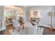 Cozy living room featuring neutral colors, elegant furniture, and ample lighting at 305 High Branch Way, Roswell, GA 30075