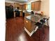 Spacious kitchen featuring granite countertops, a breakfast bar, and stainless steel appliances at 4832 Batiste Nw Ln, Acworth, GA 30101