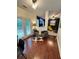 Bright living area with hardwood floors, neutral furniture, and double doors to the outdoors at 4832 Batiste Nw Ln, Acworth, GA 30101