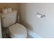 Toilet with a dual paper roll holder at 4832 Batiste Nw Ln, Acworth, GA 30101
