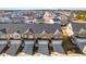 Aerial view of a neighborhood with rows of townhomes at 853 Pensive Run, Dacula, GA 30019