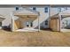 Back patio with a ceiling fan and a wood fence at 853 Pensive Run, Dacula, GA 30019